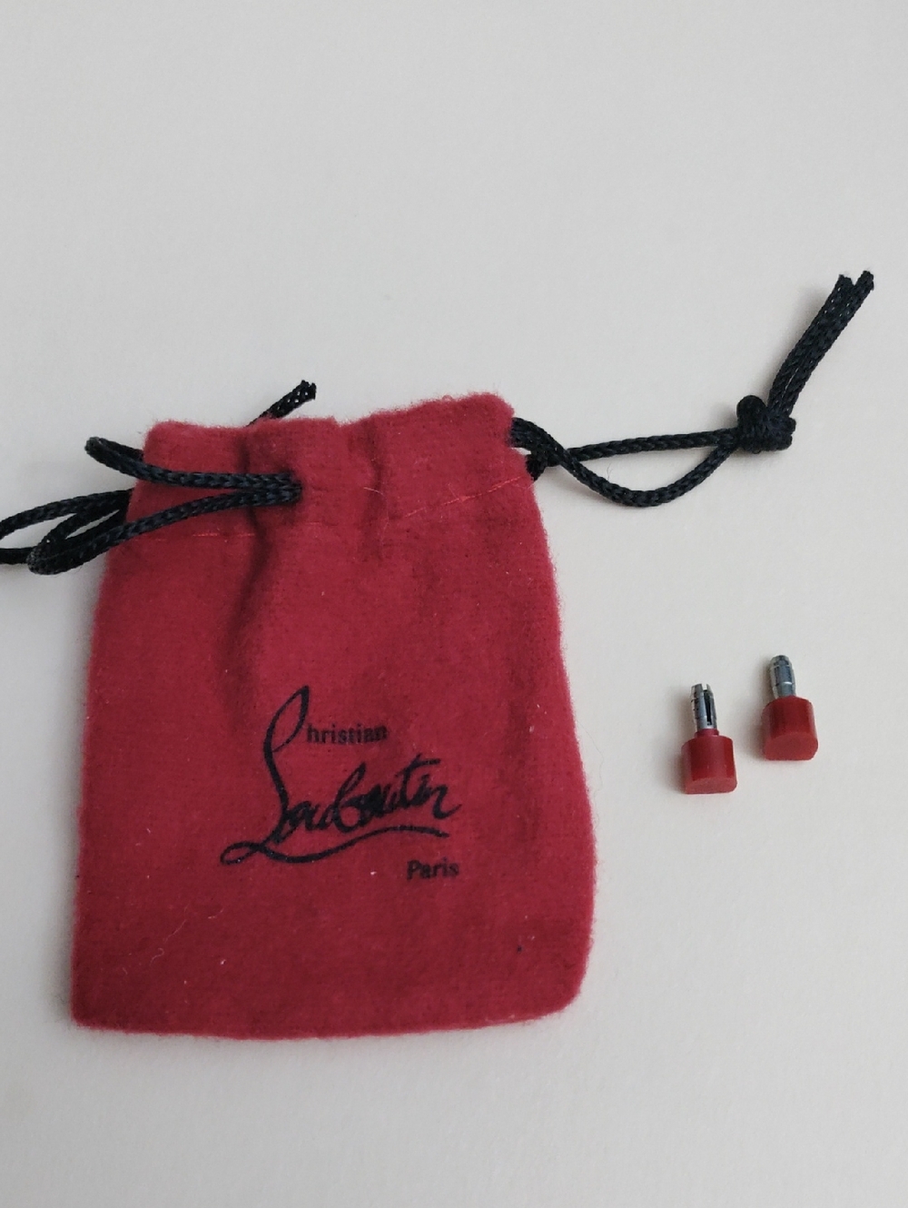 Christian Louboutin Red Heel Tips/ Drawstring Pouch